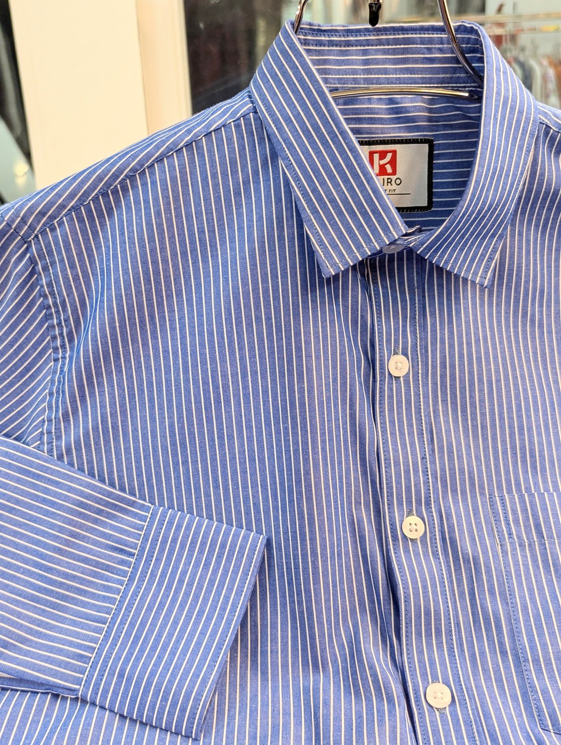 Blue  and white stripe full sleeve shirt.