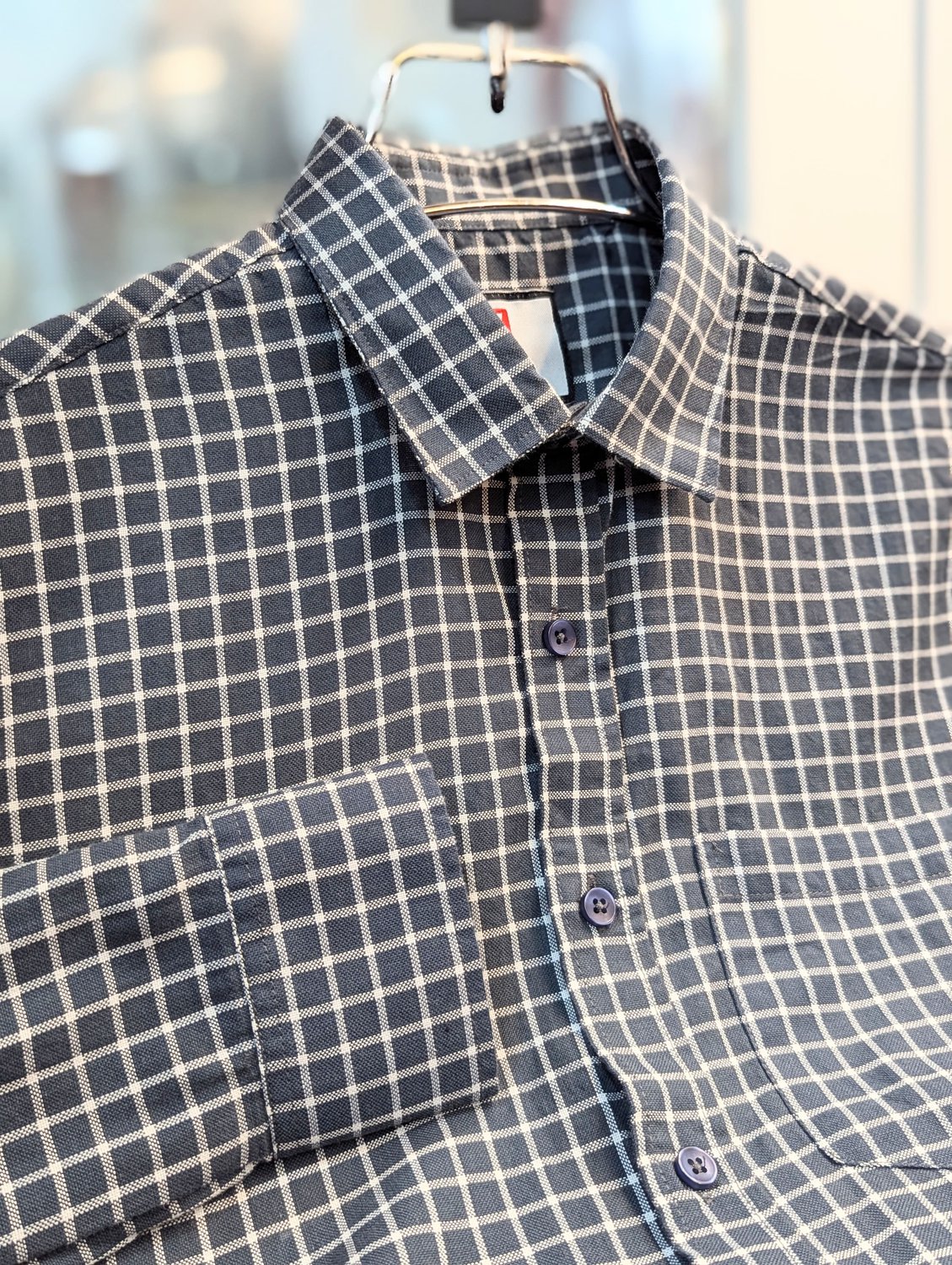 Ash and blue check full sleeve shirt.