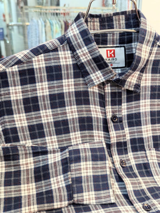 Blue and white check full sleeve shirt.