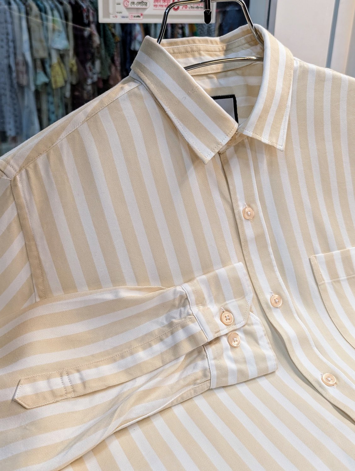 Cream and white stripe  full sleeve shirt.